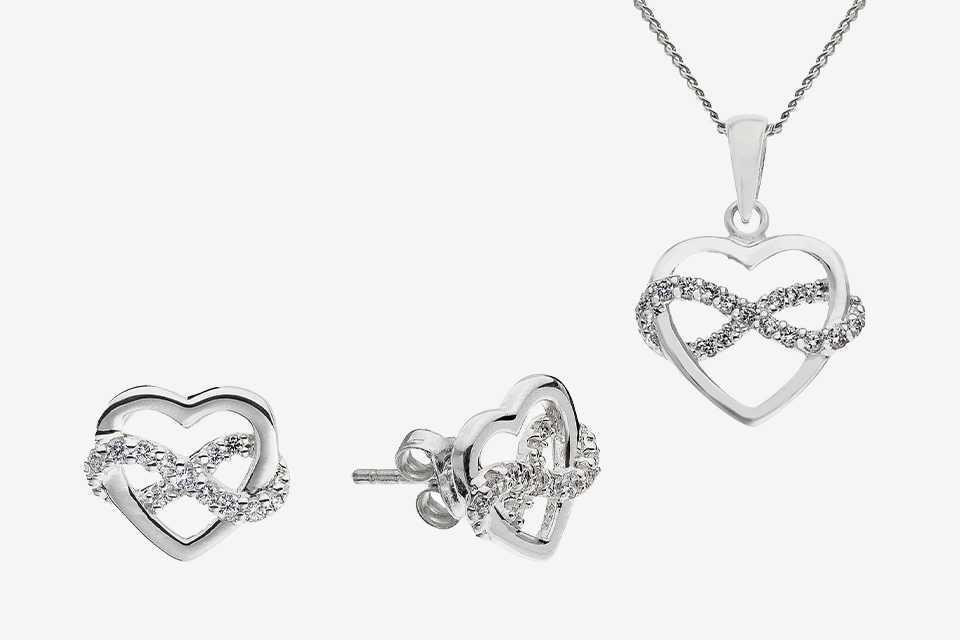 Revere silver jewellery set with cubic zirconia heart pendant and earrings.