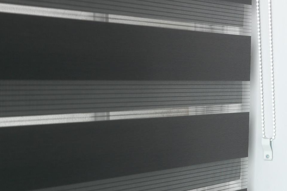 Day and night blinds in black.