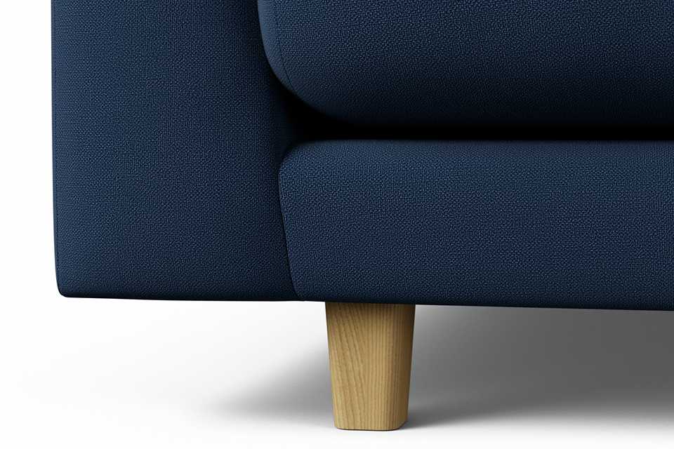 : Close-up view of the front leg of Habitat Emely Fabric 2 Seater Sofa - Navy Blue - Ash Leg.