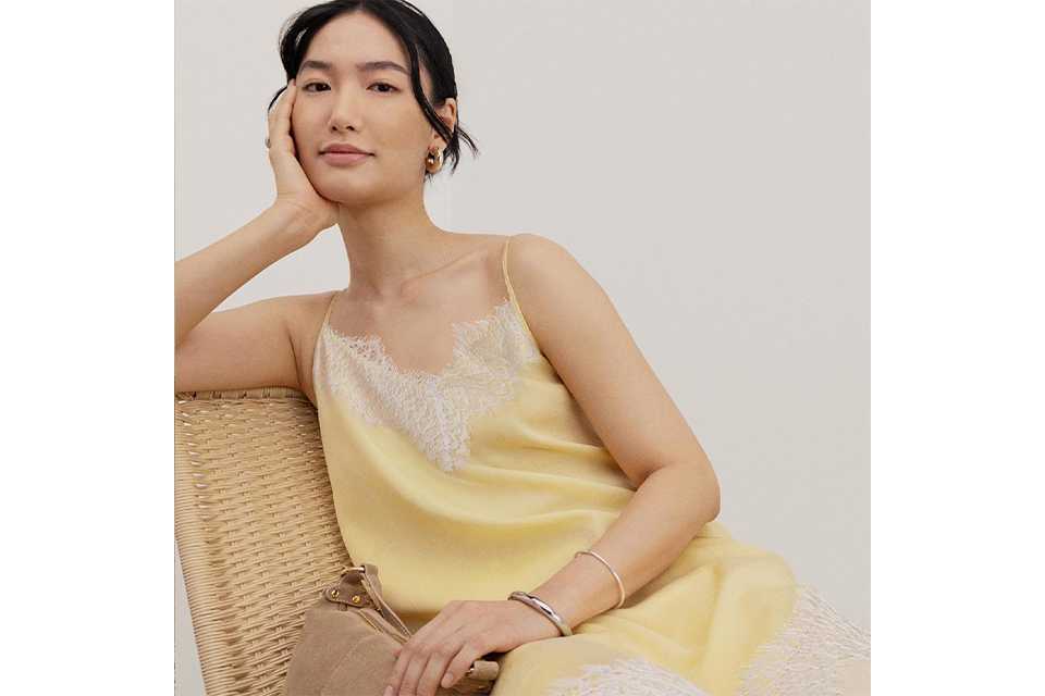 Seasonal summer outfit featuring a lightweight top and accessories, showcasing current warm‑weather fashion trends.