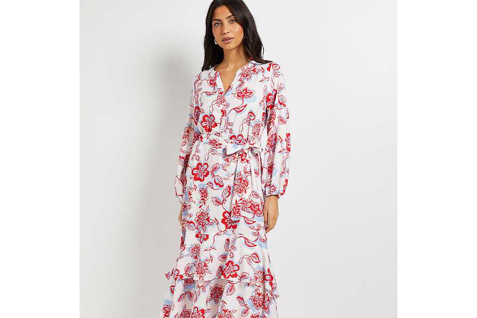 Floral summer outfit styled for special occasions, suitable for wedding guest dressing in warmer weather.