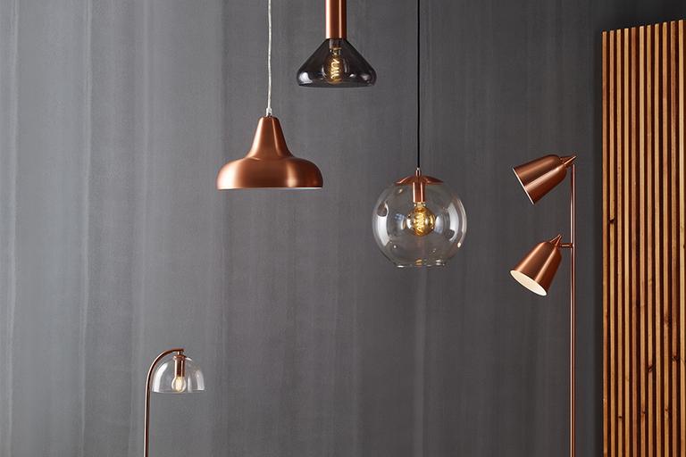 An image of various copper and industrial style lights.