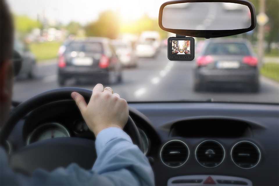 A dash cam installed on a car.