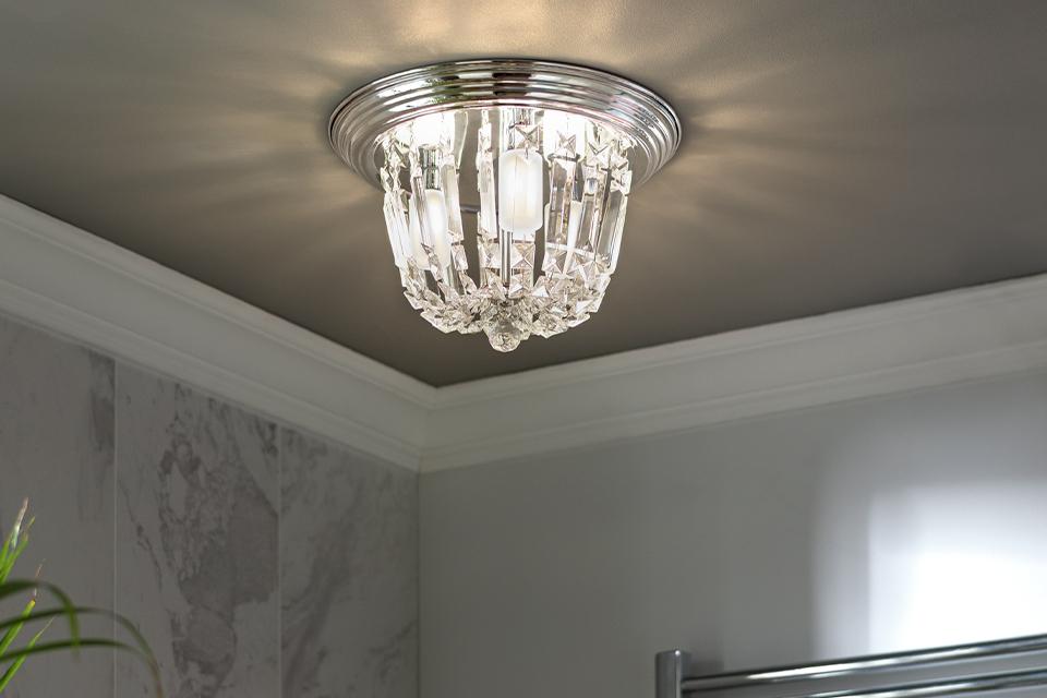 Image of a glass, flush bathroom ceiling light.