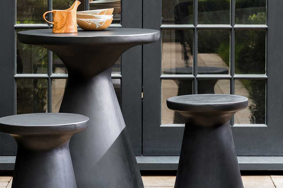 An image of a concrete bistro garden set.