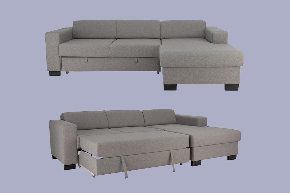 Image of a grey sofa bed with the bed section pulled out.