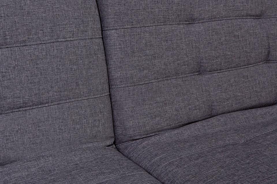 Close up image of grey upholstery fabric.