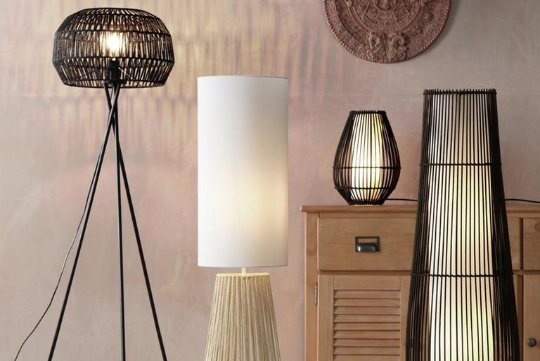 A collection of rattan floor lamps, table lamps, and ceiling lights.