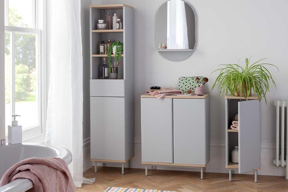 The grey Habitat Freja tallboy, 1-door cabinet and 2-door cabinet in a bathroom.