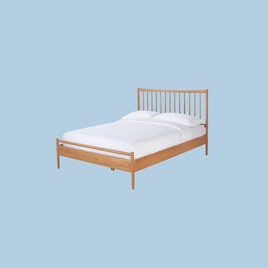 A wooden framed bed.