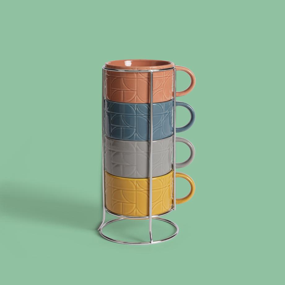 Four stacked cups in a metal holder.