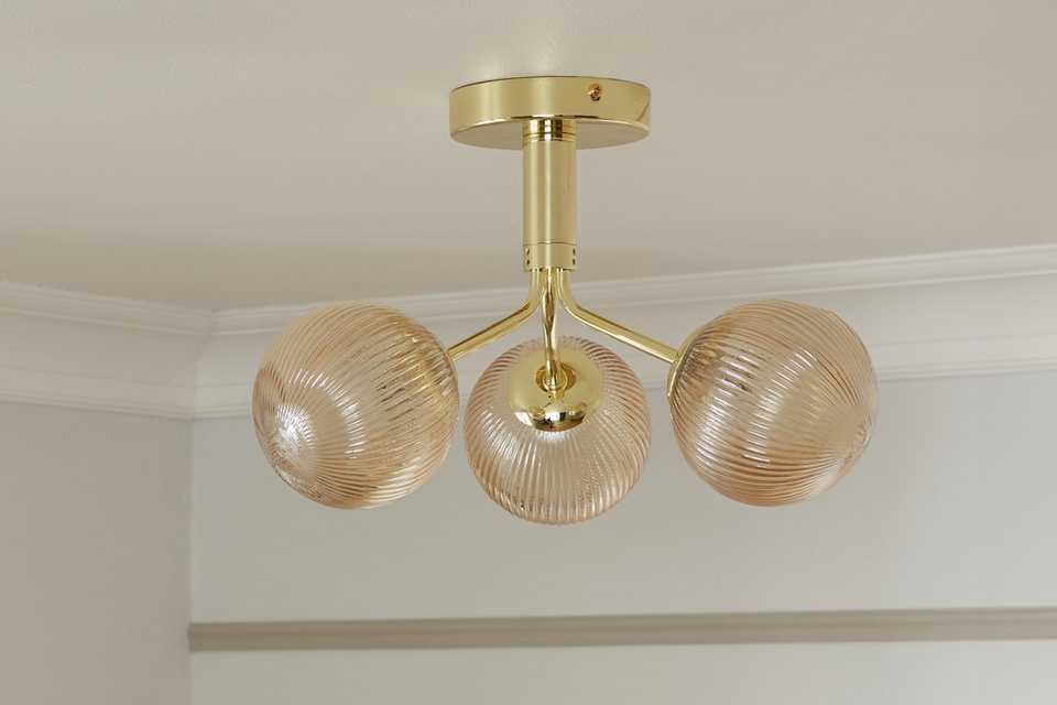 Ceiling light hanging in hallway.