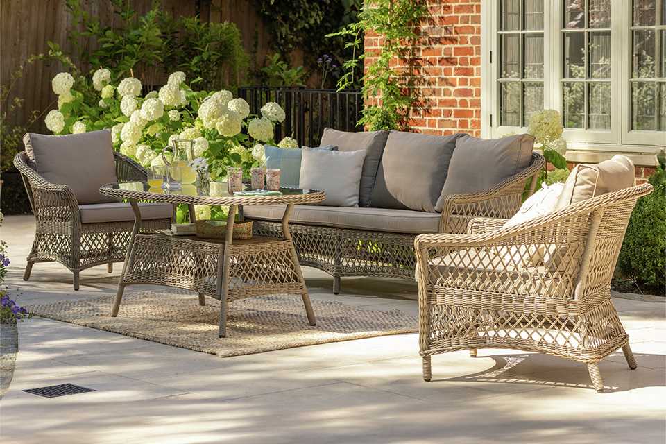A Habitat Palermo 5 seater rattan effect garden sofa set.