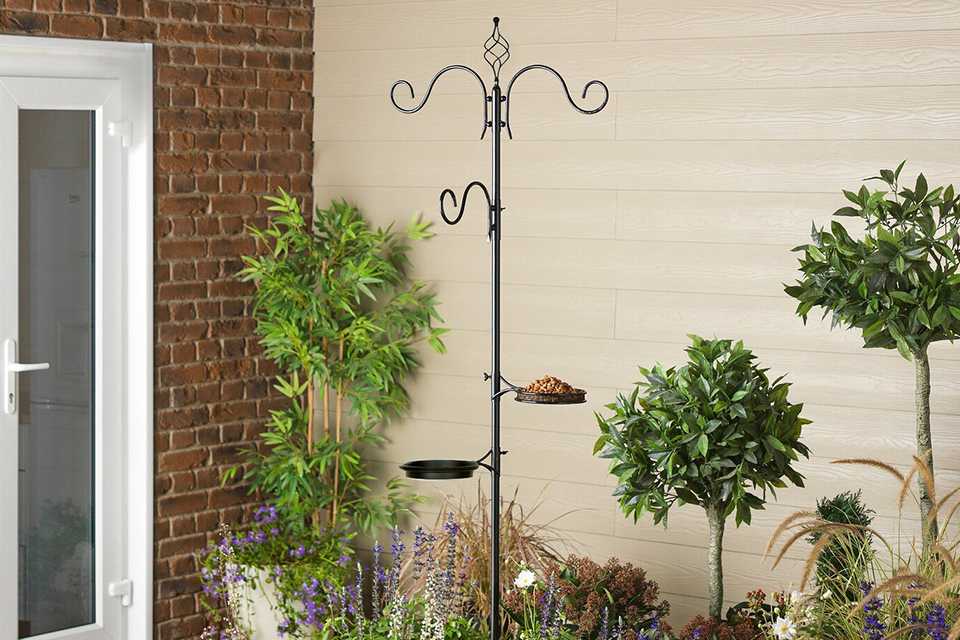 Argos Home wild bird feeding station placed outdoors.