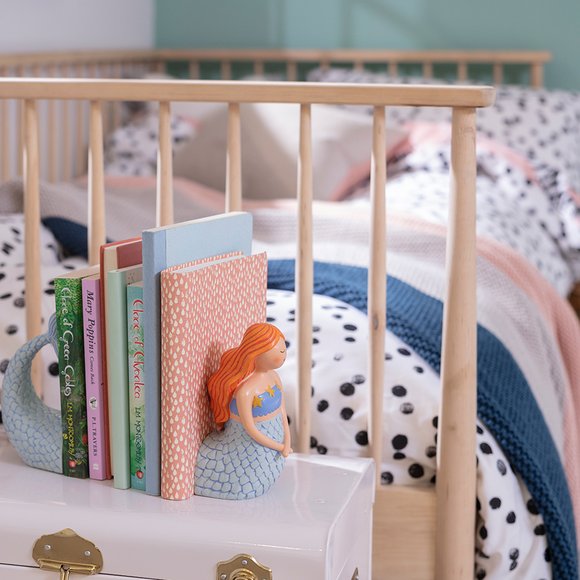 Habitat kids mermaid bookends in a kid's room.