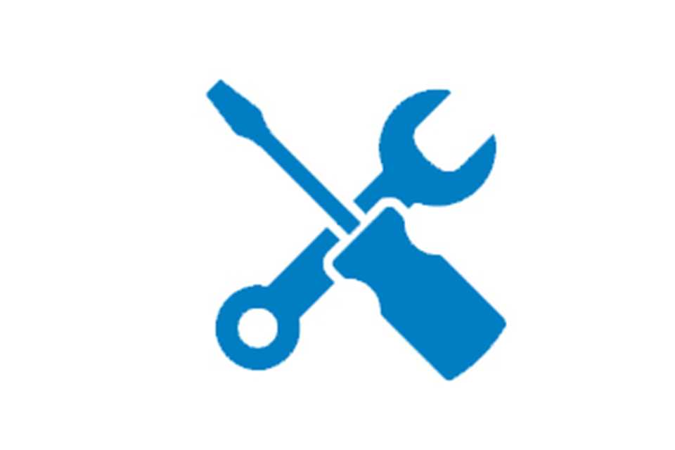 A blue outline of a screwdriver and a spanner against a white background.