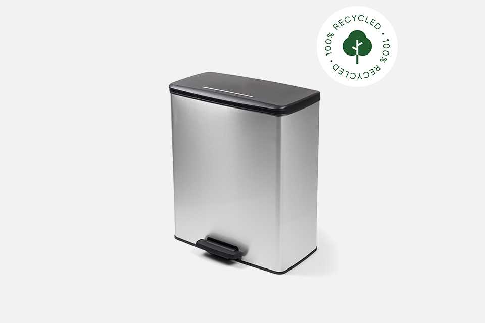 A Curver 65 litre kitchen bin with sustainbilty sticker on top right corner.