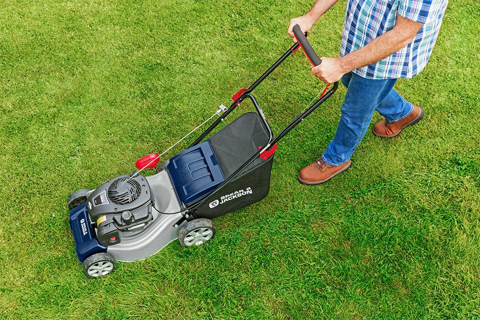 Petrol lawnmower.