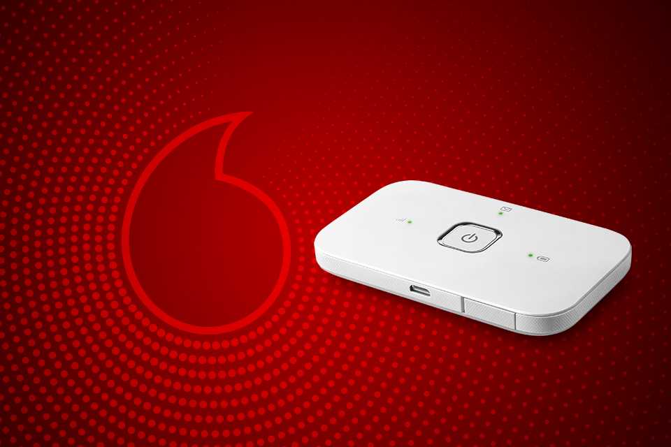A White Vodafone mobile broadband device.