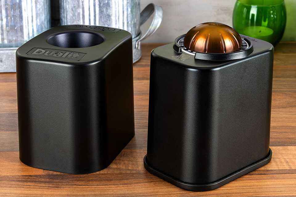 A Dualit EcoPress™ for Vertuo pod recycler with a Nespresso® Vertuo pod.