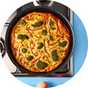 Food being cooked in a pan.