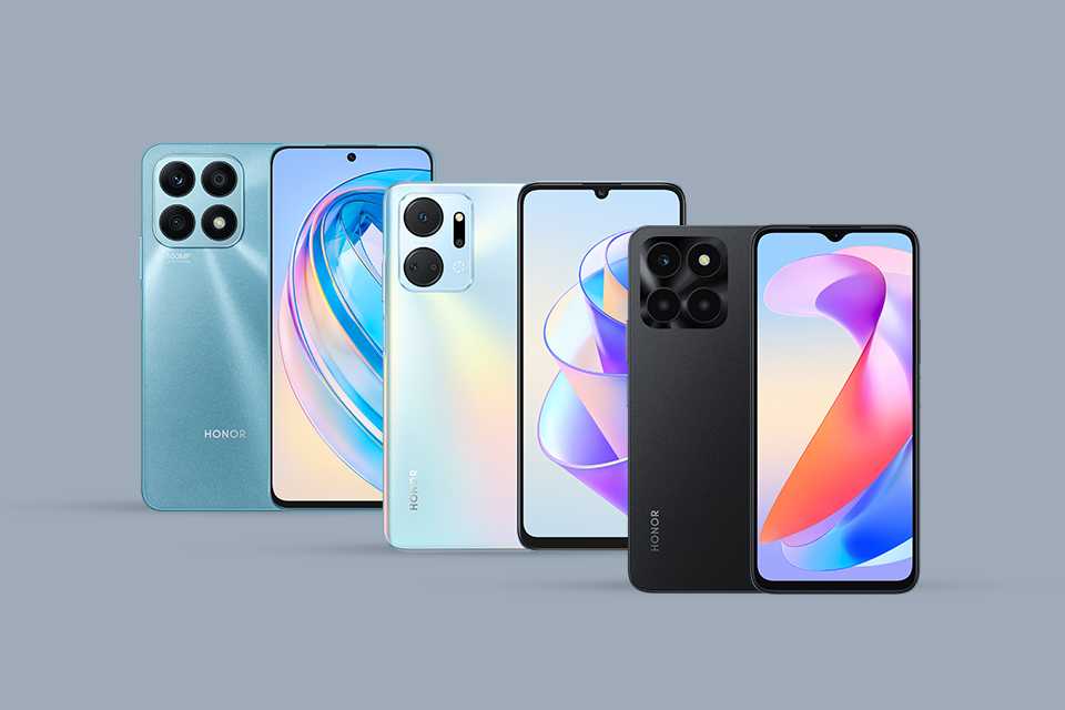 Two HONOR X6a smartphones in cyan and black colour along with a silver HONOR X7a mobile phone.