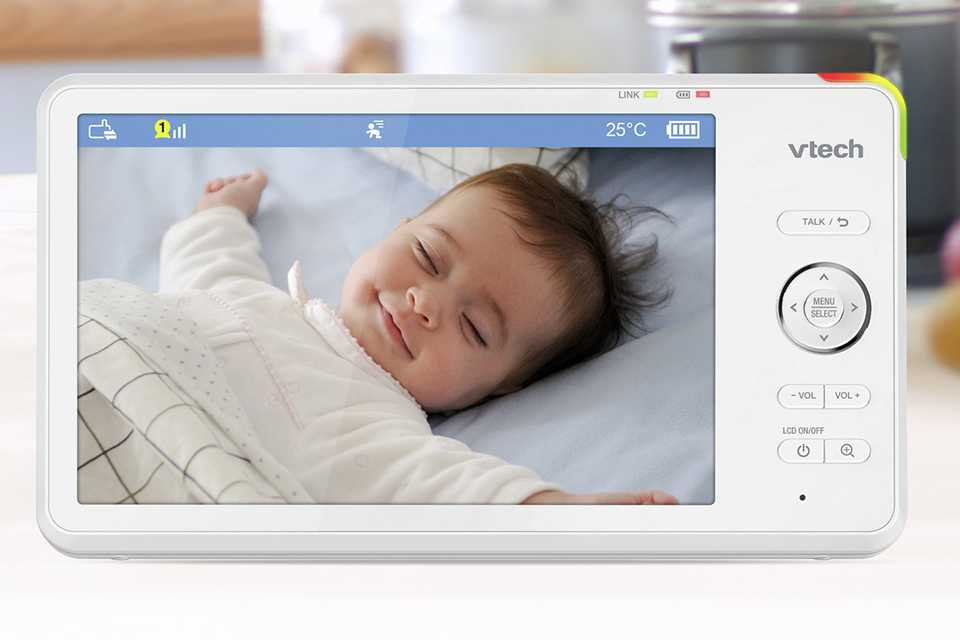 A baby on a Vtech RM7766 HD Smart Pan And Tilt Smart Baby Monitor.