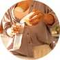 A mother using a Medela Motion InBra Single Electric Breast Pump.