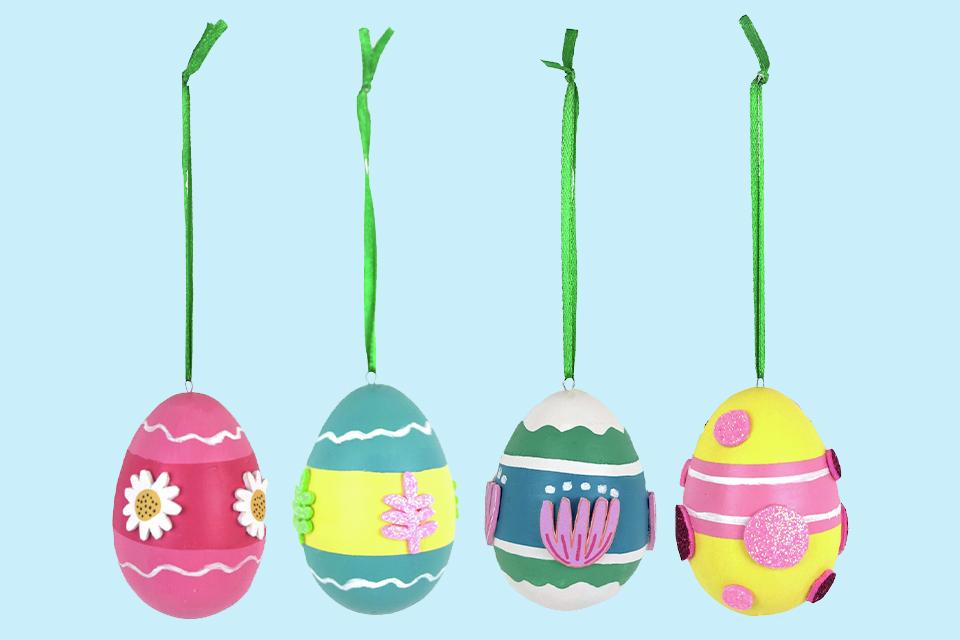 Four painted Easter egg decorations.