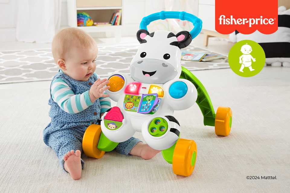 A baby sitting next to a Fisher Price walker.