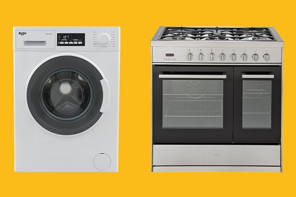 A white Bush spin washing machine and a stainless steel double oven gas cooker.