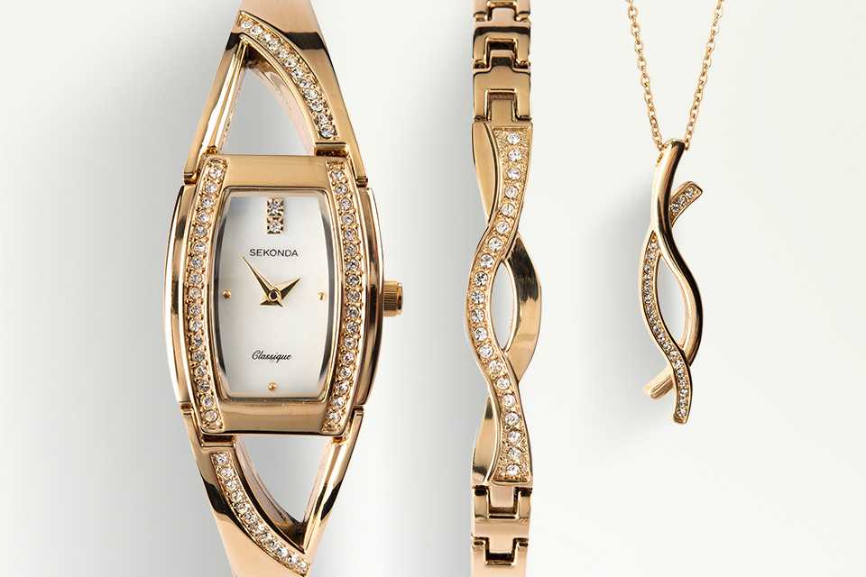 A crystal golden Sekonda bracelet, necklace and watch set.