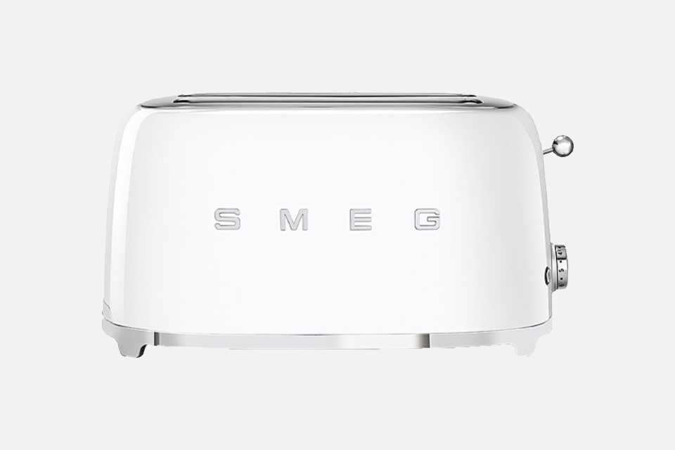 A Smeg white four slice toaster.