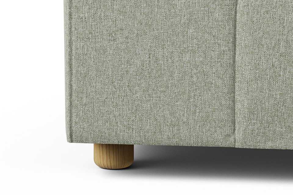 The lars sofa in sage green.
