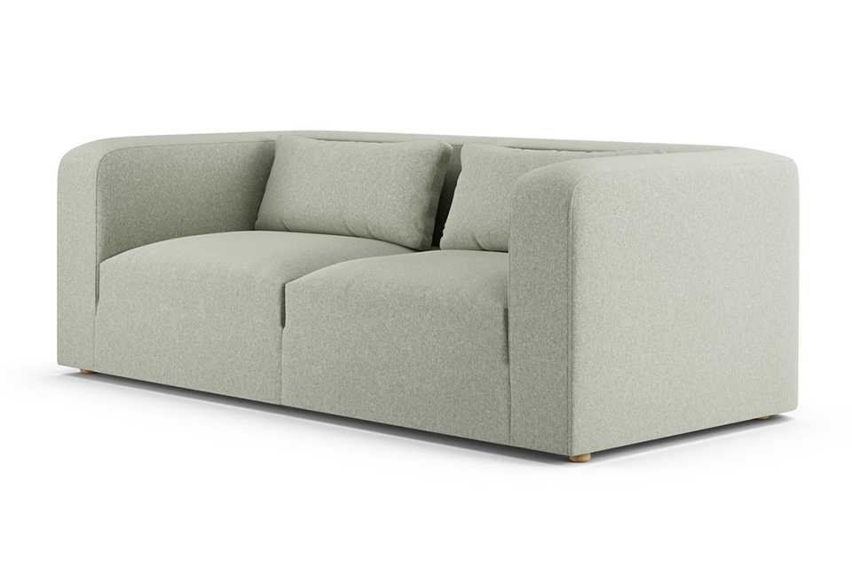 The lars sofa in sage green.