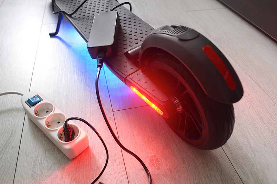 Electric scooter being charged.