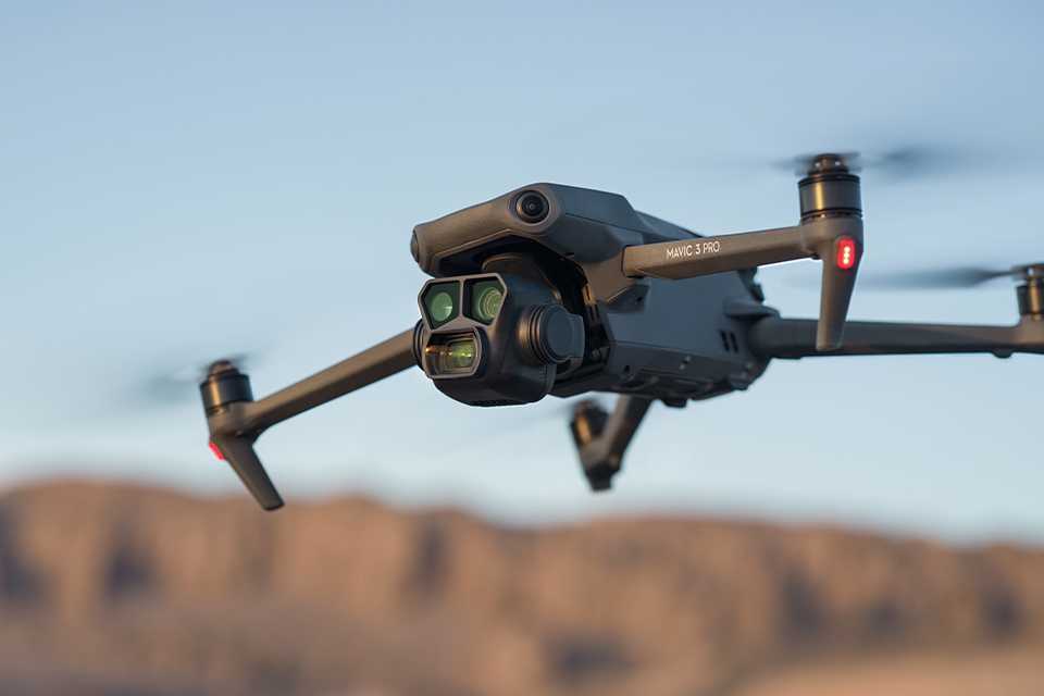 A DJI Mavic 3 Pro camera drone in flight.
