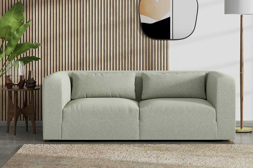 The lars sofa in sage green.