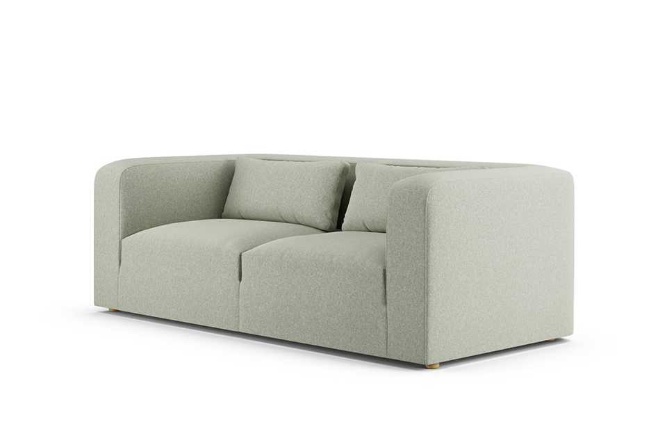 The lars sofa in sage green.