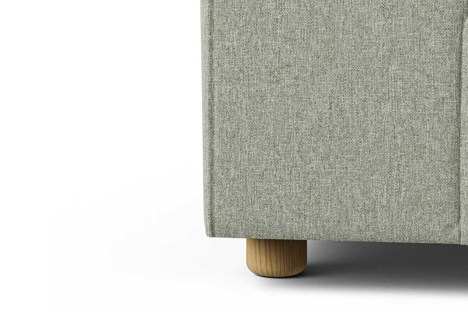 The lars sofa in sage green.