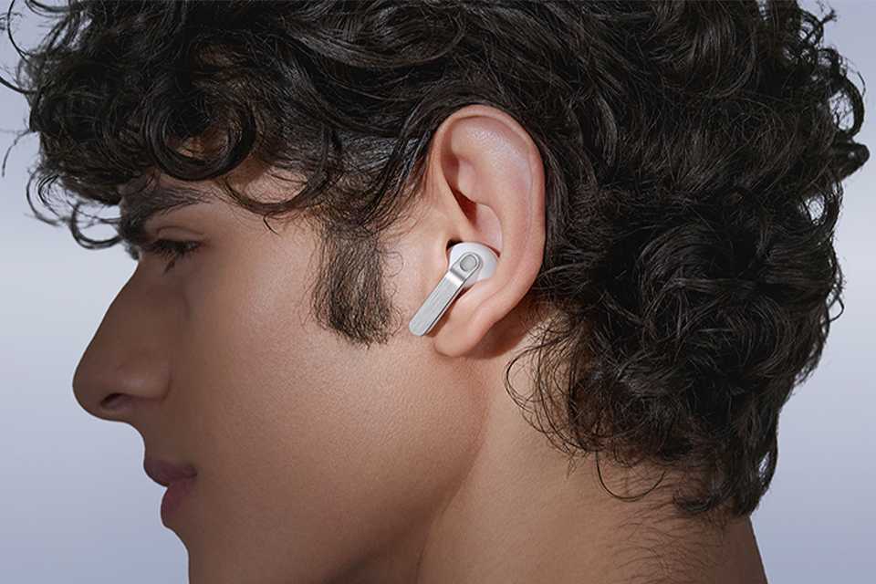 Person wearing Samsung Galaxy Buds4 Pro in ear.