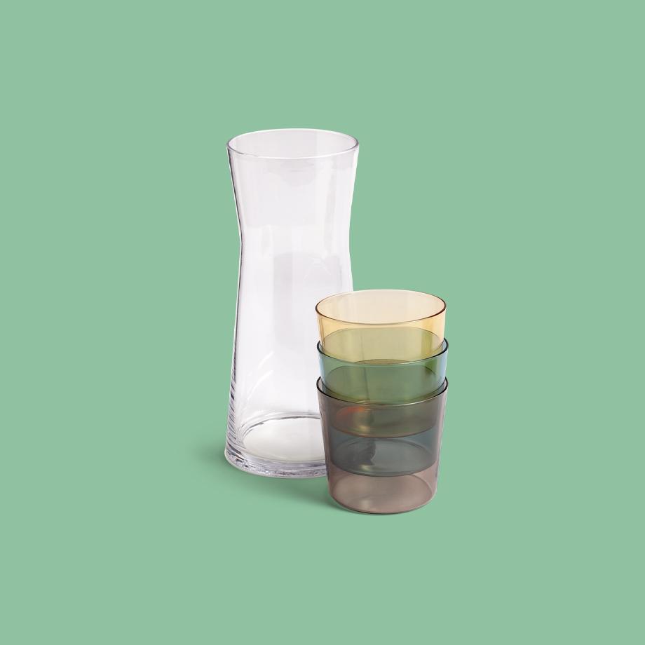 Carafe and four colourful glasses.