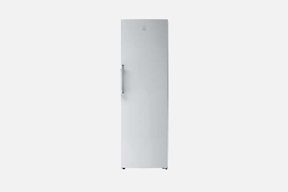 A white Indesit tall upright freestanding fridge.