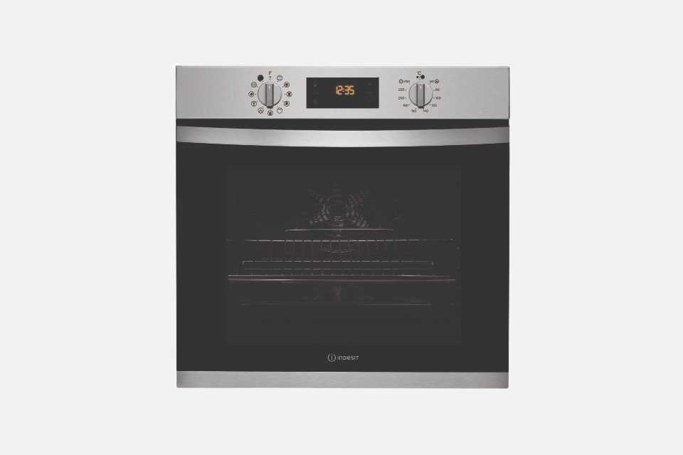 A stainless steel Indesit built-in single electric oven.