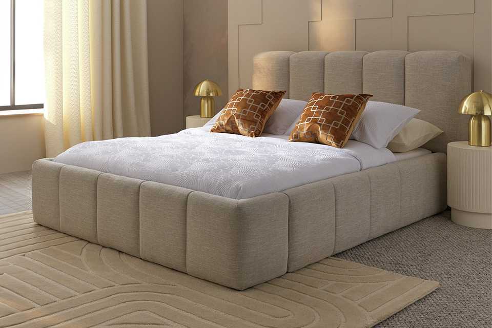 Cream bubble bed in bedroom with ottoman storage undeneath bed.