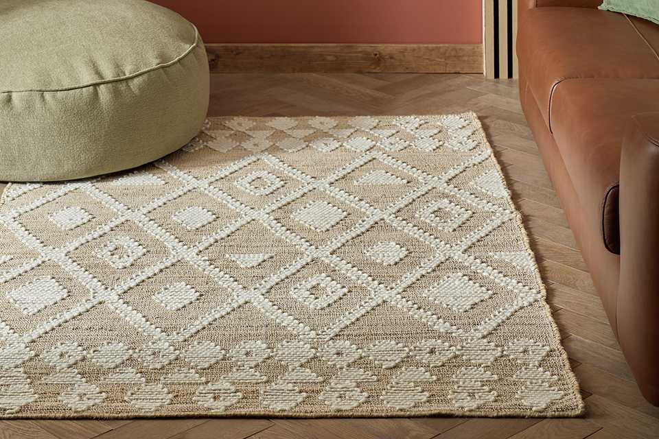 A Habitat Woven Aztec Neutral Jute Flatweave Rug.