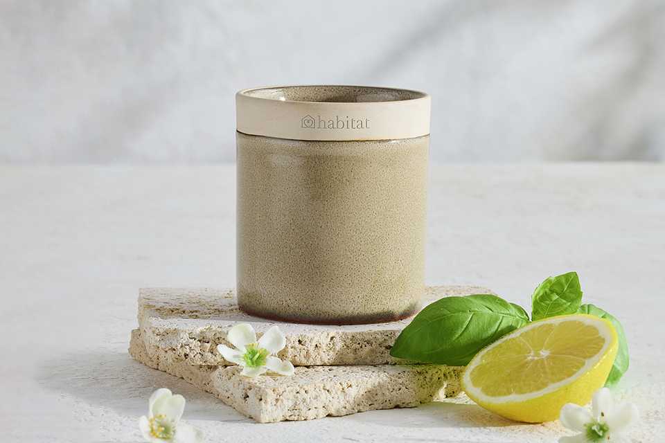 A Habitat small ceramic Geranium and Basil candle.