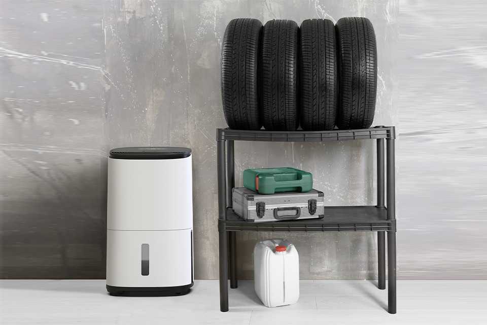 Meaco Dry Arete One 20 Litre Dehumidifier sitting in a garage.