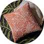 A Habitat Crewel foliage outline cushion in orange.