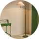 A Habitat Wiggle and taper floor lamp in green and white.